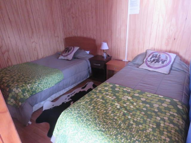 Hostal Y Cabanas Peumayen Puerto Guadal Esterno foto