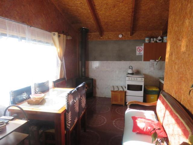 Hostal Y Cabanas Peumayen Puerto Guadal Esterno foto